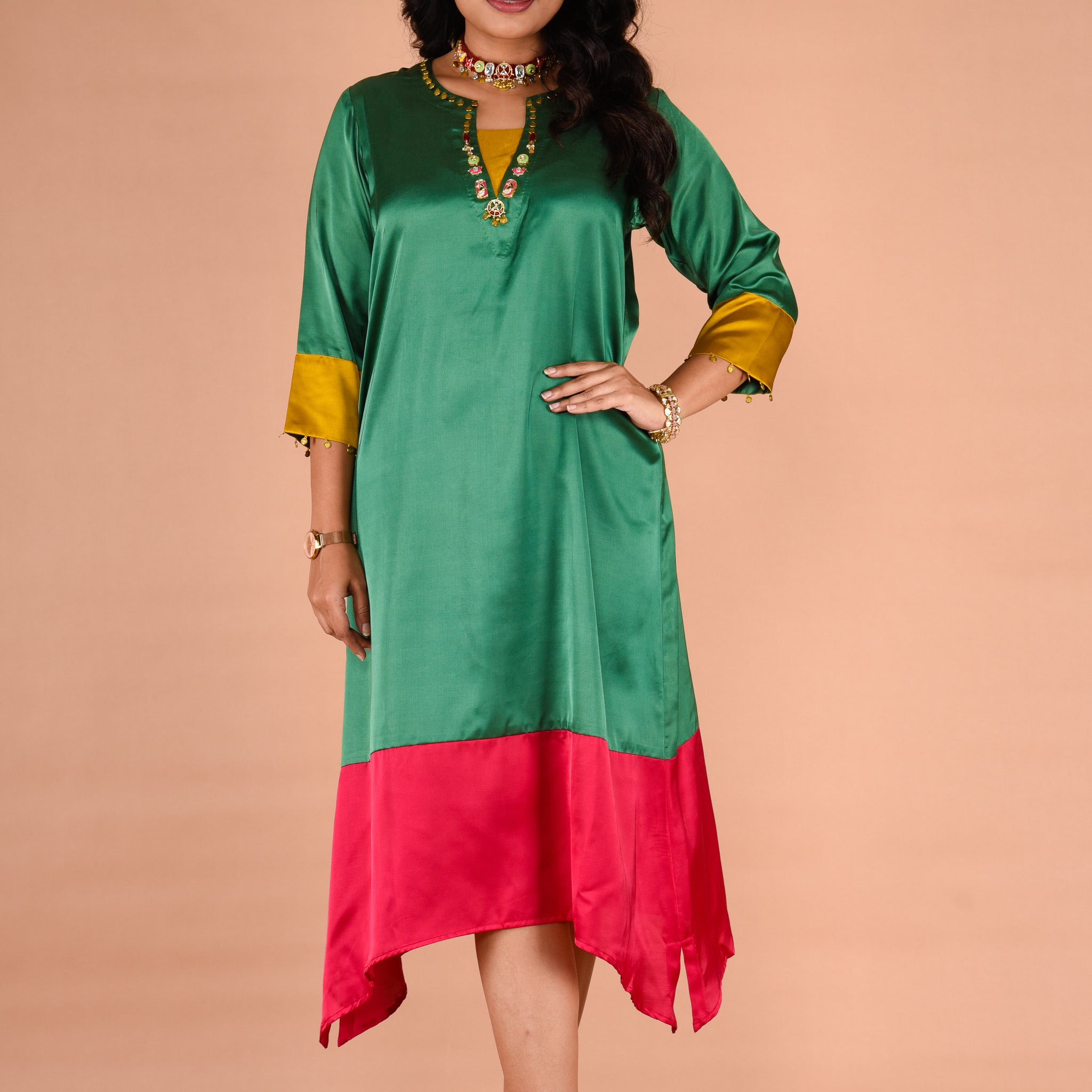 A-Line tail cut dress with metal motifs detailing