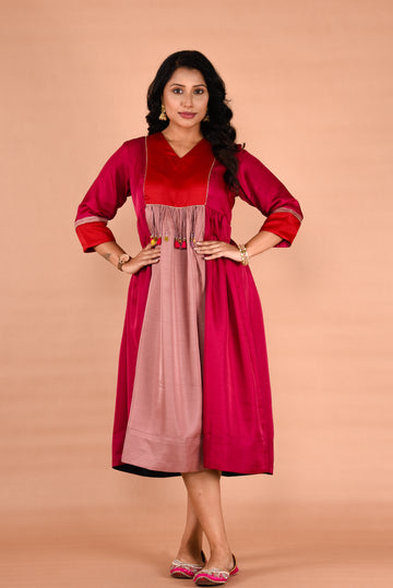 Gathered waistline Dress with tassel detailing