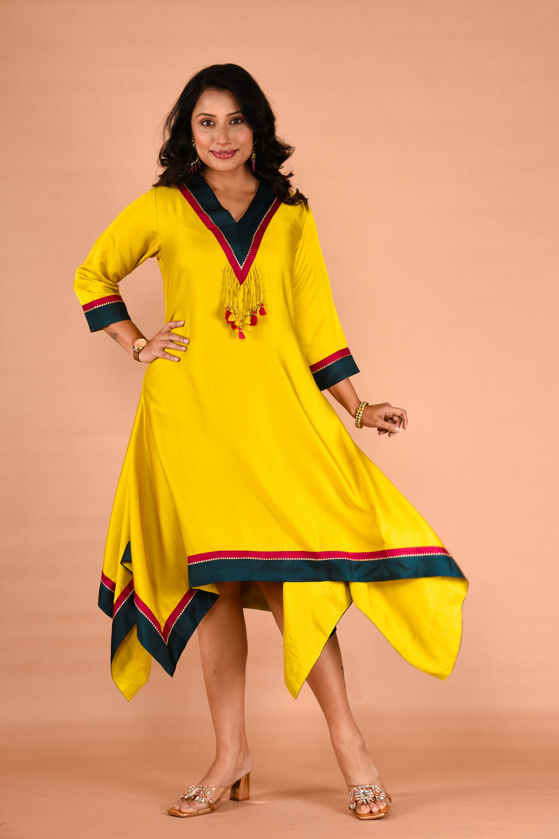 Asymmetrical A-line dress with tassel detailing