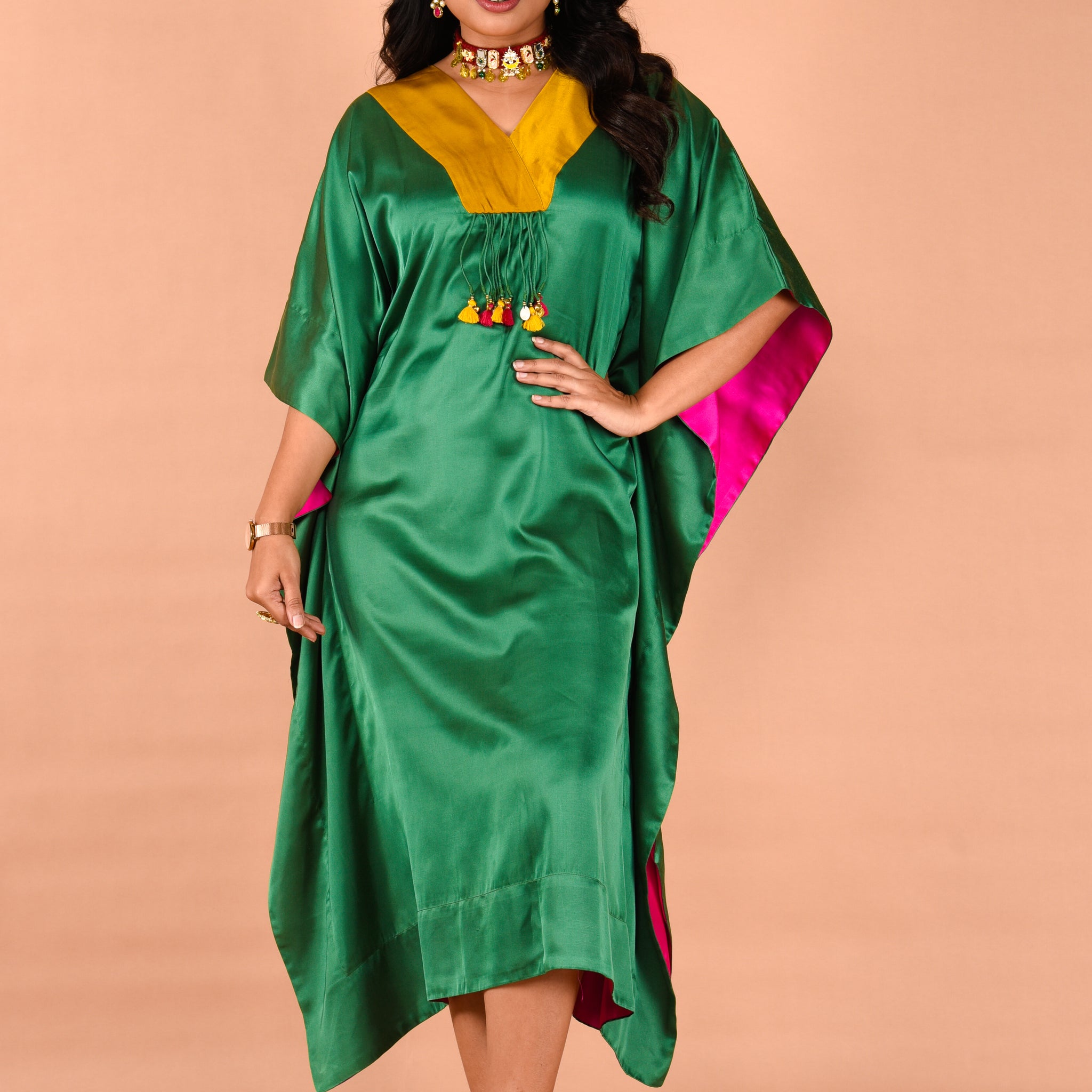 Stylish kaftan dress with tassel detailing at neck