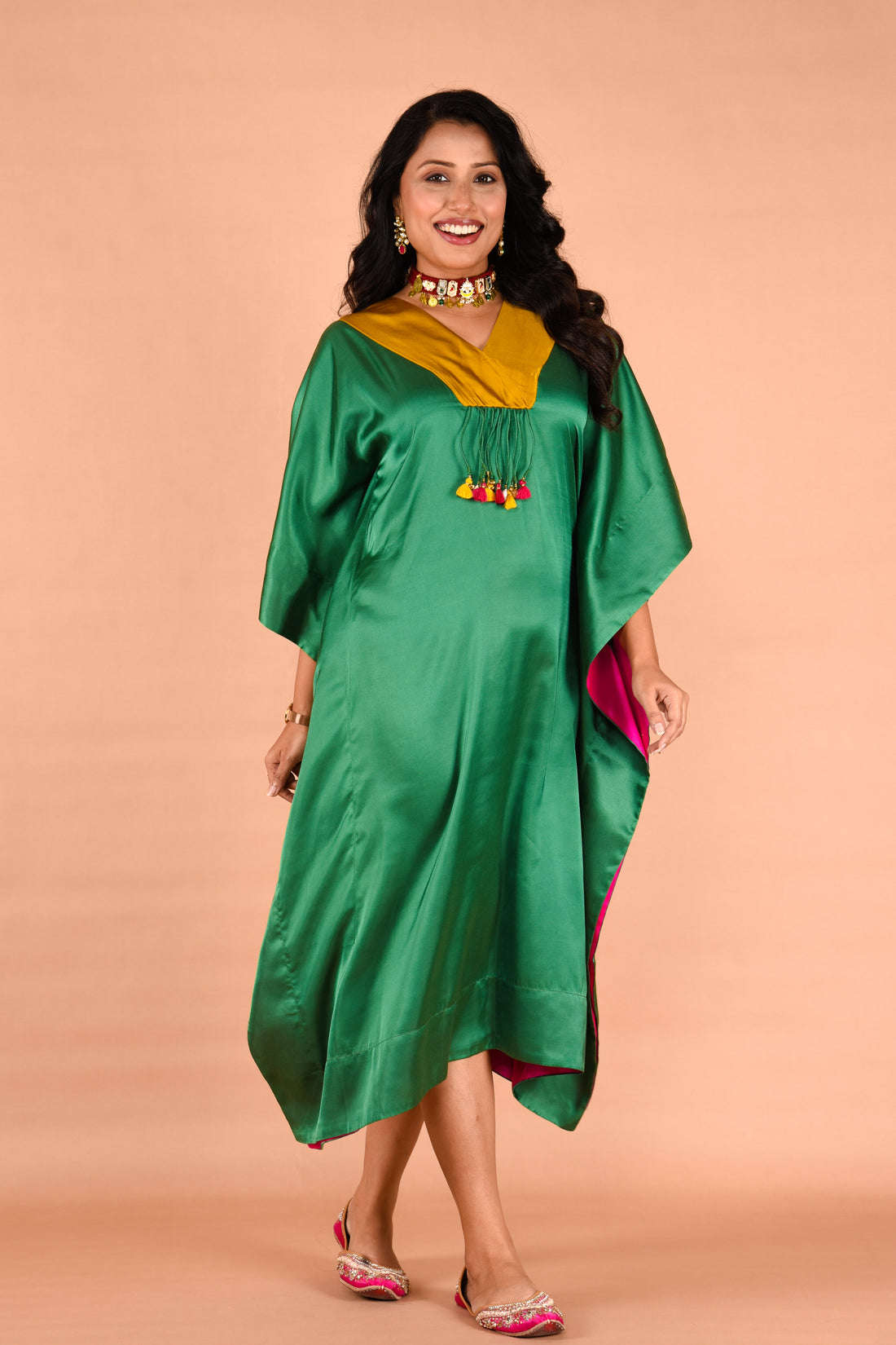 Stylish kaftan dress with tassel detailing at neck